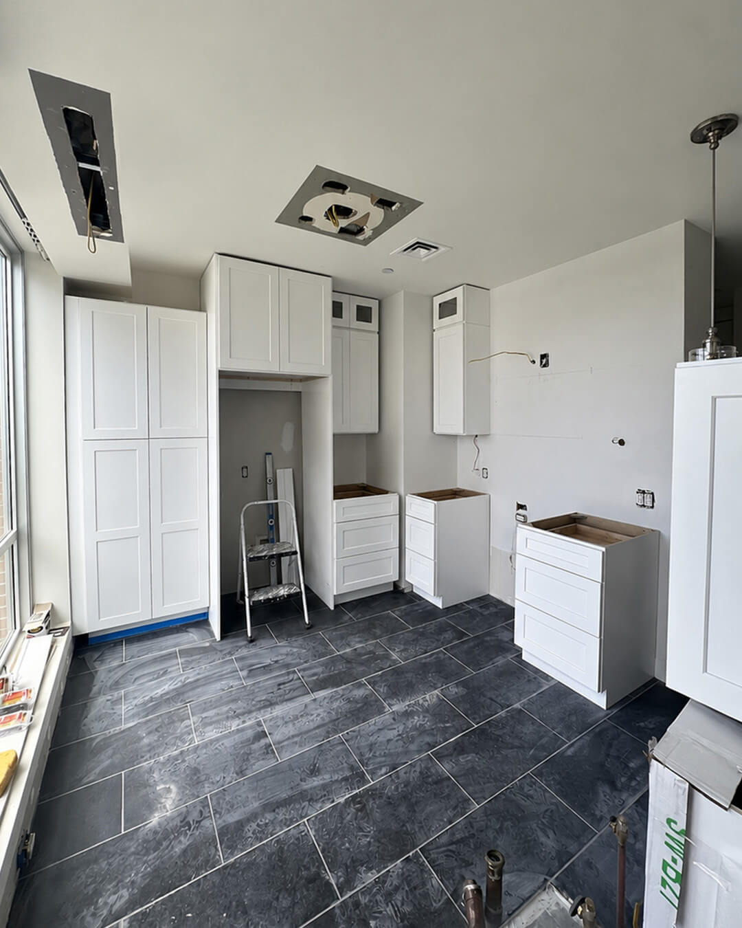 Build — Open-Concept Kitchen Renovation with Peninsula Seating | Boston, MA