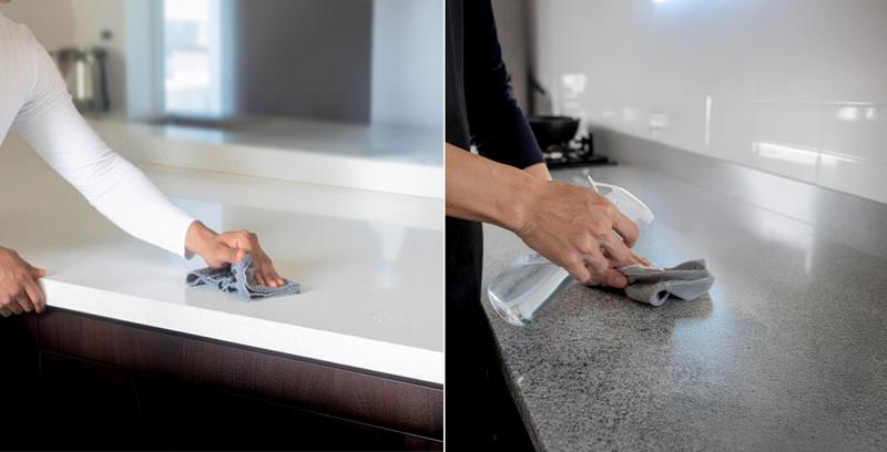 Hands cleaning quartz and granite countertops with microfiber cloths and gentle cleaner to maintain surface shine