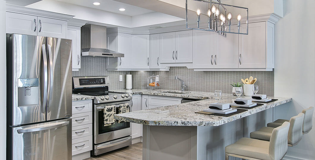 Modern kitchen with grey cabinets