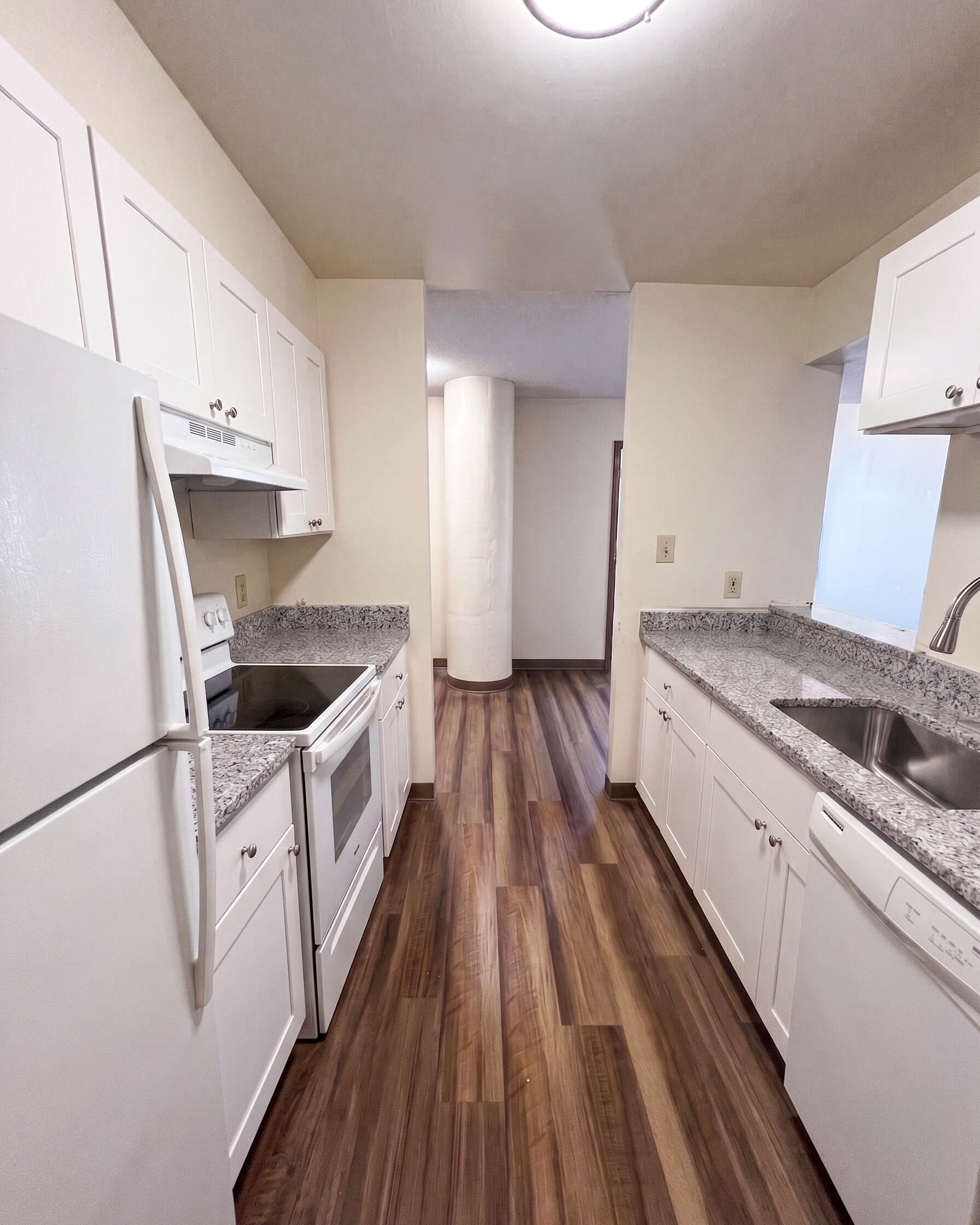 Finish — Kitchen Renovation with Caledonia Granite Countertops | Lawrence, MA