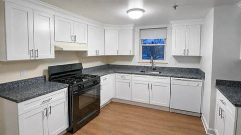 After: Methuen, MA $10K Kitchen Refresh with new Shaker cabinets and stone countertop